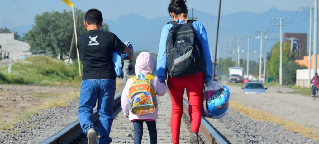Three Honduran children walk north to cross the US border and meet their parents. Source.
